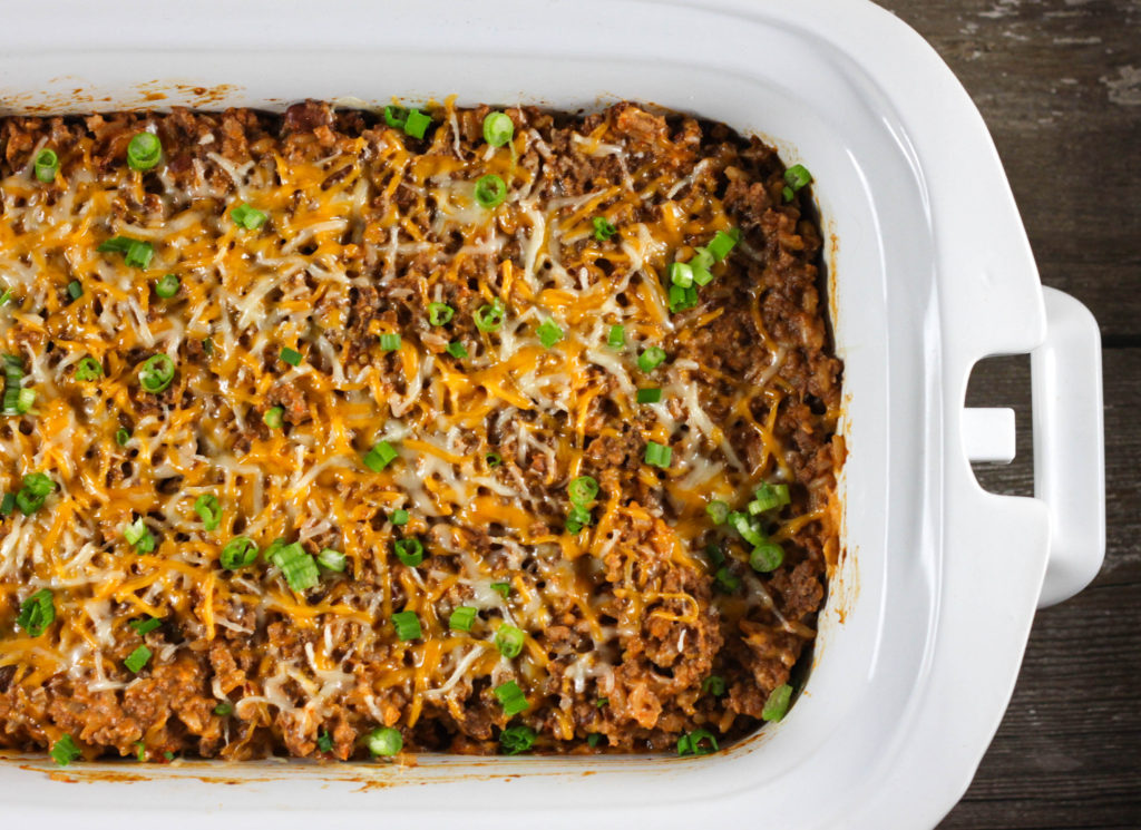Are you looking for a great dip recipe? This Crock Pot Beef Enchilada and Rice Dip has all the taste of your favorite Mexican meal but in dip form! 