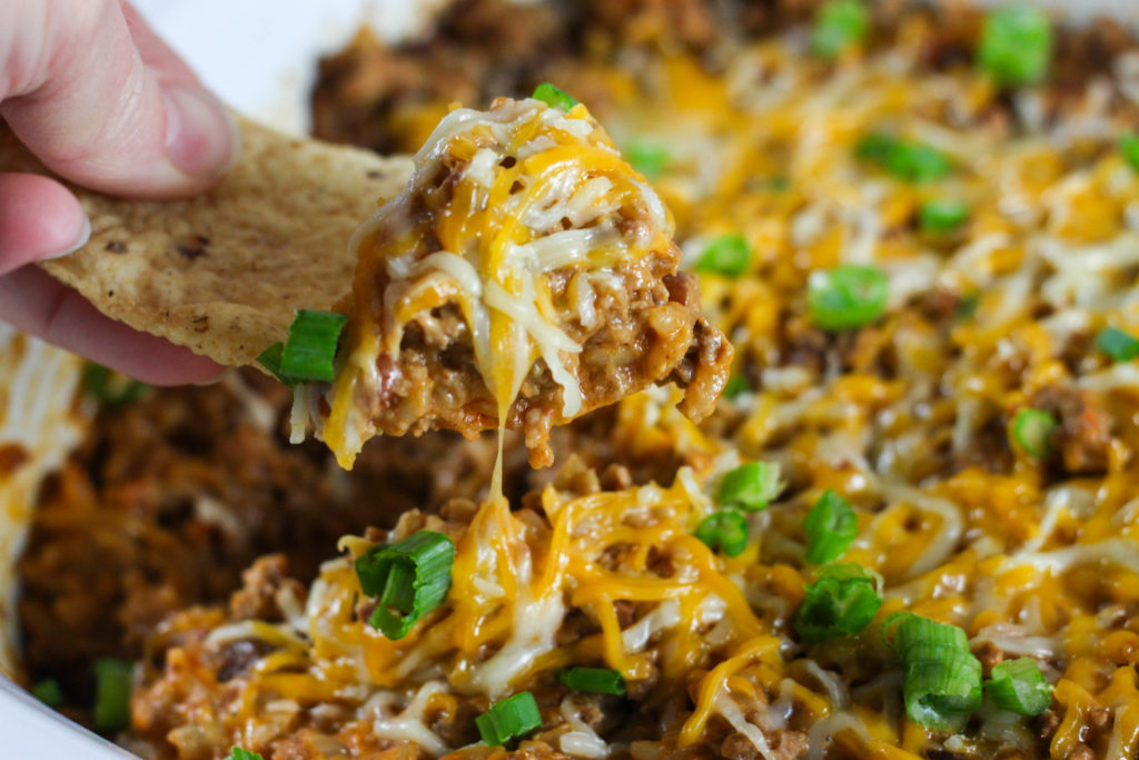 Are you looking for a great dip recipe? This Crock Pot Beef Enchilada and Rice Dip has all the taste of your favorite Mexican meal but in dip form!