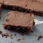 This Texas Sheet Cake is melt in your mouth good! An easy brownie like chocolate cake to feed a crowd.