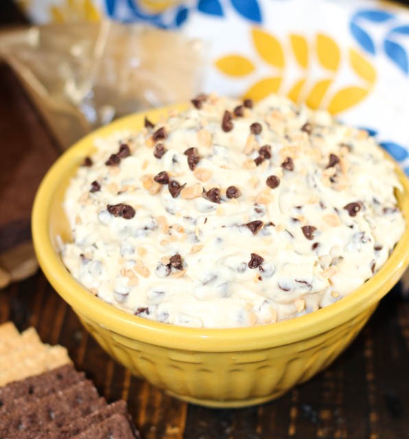 This easy dip recipe will quickly become a family favorite. Toffee Chocolate Chip Cookie Dough Dip is cookie dough that is safe to eat and oh so good! 