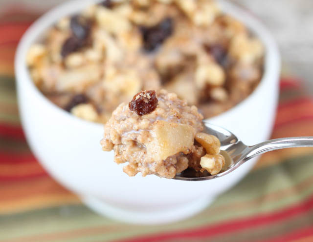 This Apple Pie Oatmeal recipe is made with steep cut oats overnight in the slow cooker so you can wake to a healthy breakfast!