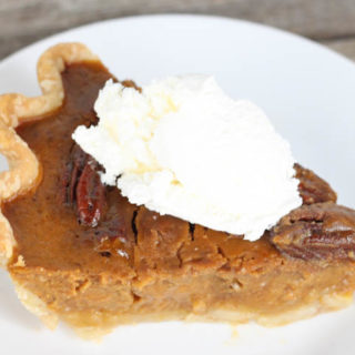This Pumpkin Pecan Pie is the best of both of the traditional holiday pies, pumpkin and pecan, combined! A must have holiday dessert!
