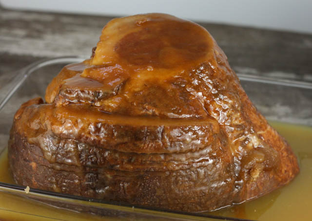 This Slow Cooker Holiday Brown Sugar Ham has all your favorite traditional flavors including pineapple and maple syrup and will be a hit at your next Holiday!