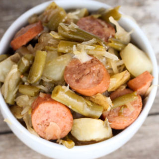 This Smoked Sausage, Sauerkraut Stew with Potatoes and Green Beans is an old fashioned dinner recipe that is made on the stove top.