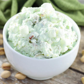 Pistachio Salad is the perfect dessert recipe made with pineapple, marshmallows, cool whip, grapes and pistachio pudding mix.