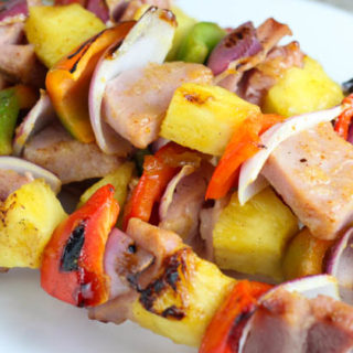 These Grilled Ham and Pineapple Kabobs are a simple and easy twist on the traditional kabob recipe. The glaze is delicious making this recipe an easy summer dinner idea!