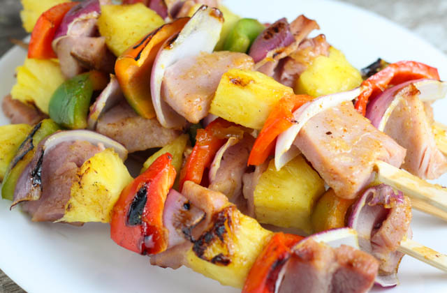 These Grilled Ham and Pineapple Kabobs are a simple and easy twist on the traditional kabob recipe. The glaze is delicious making this recipe an easy summer dinner idea! #grilling #kabob #easyrecipe