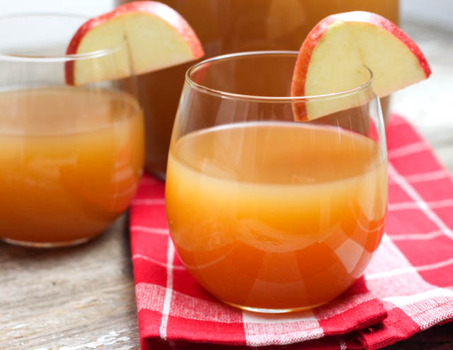 Spiked Apple Pie Punch is a fun fall drink recipe that includes alcohol and tastes great served cold or warm. 