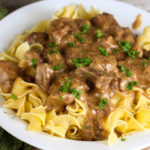 Company Beef is an easy stew beef recipe that uses 5 ingredients and is made with ginger ale and onion soup packet and tastes great served over egg noodles.